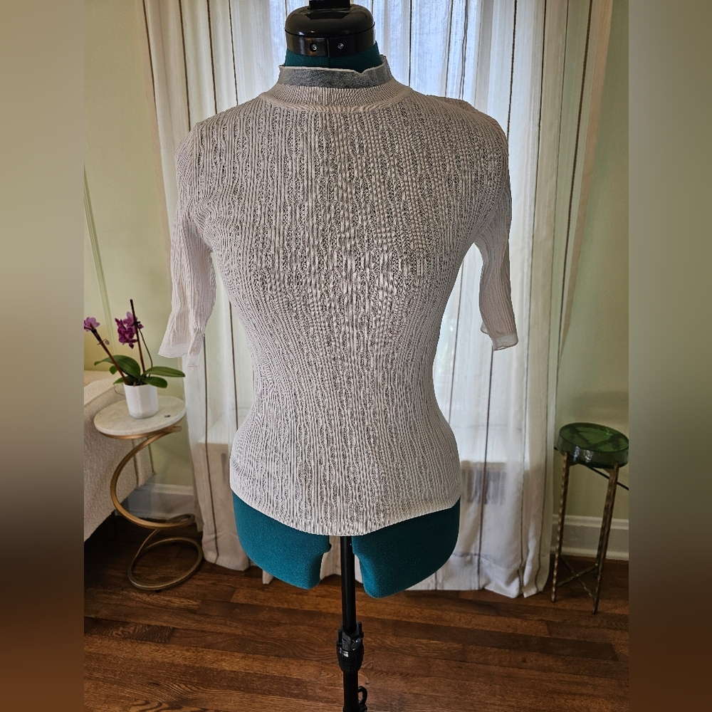 White knit top with sleeves